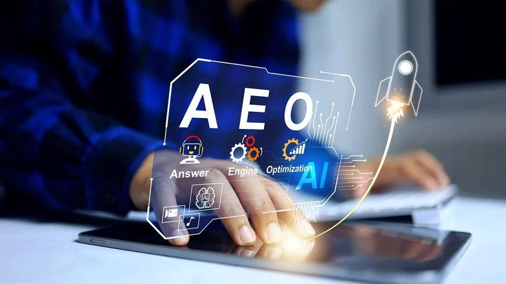 Answer Engine Optimization: Why It Is Future of Search. AEO and a person searching on laptop
