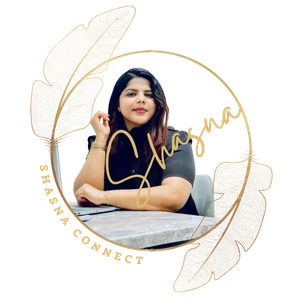 Freelance Digital Marketing Expert in Riyadh:There is a decorative gold circle around a woman sitting at a table with her arm on it. The circle has the name "Shasna" on it.